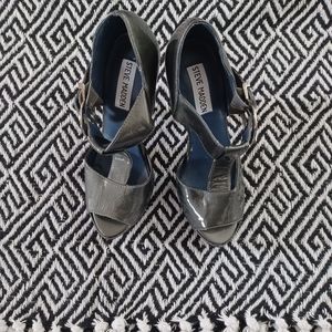 Grey patent leather 4 inch heels.  These heels are Steve Madden and very lighty